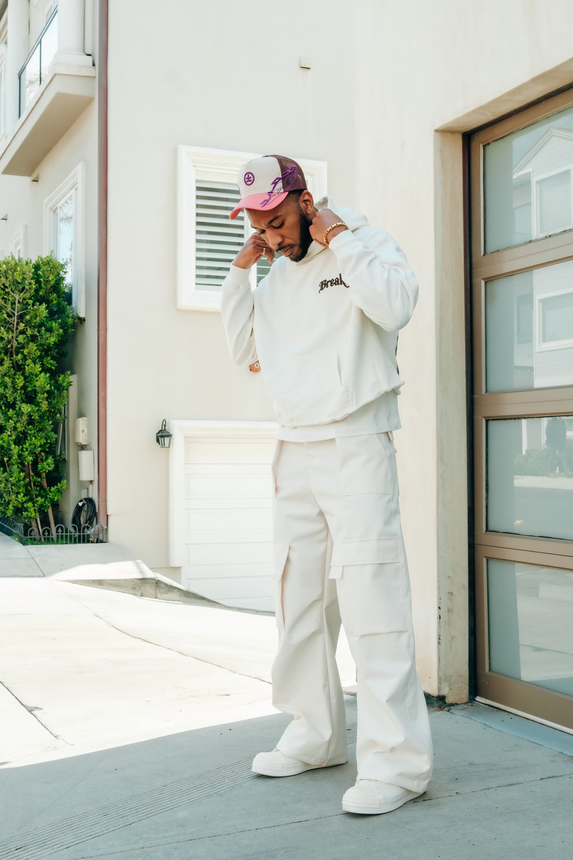 Cream Denim Cargo Pants with relaxed fit and utility pockets for men’s streetwear.
